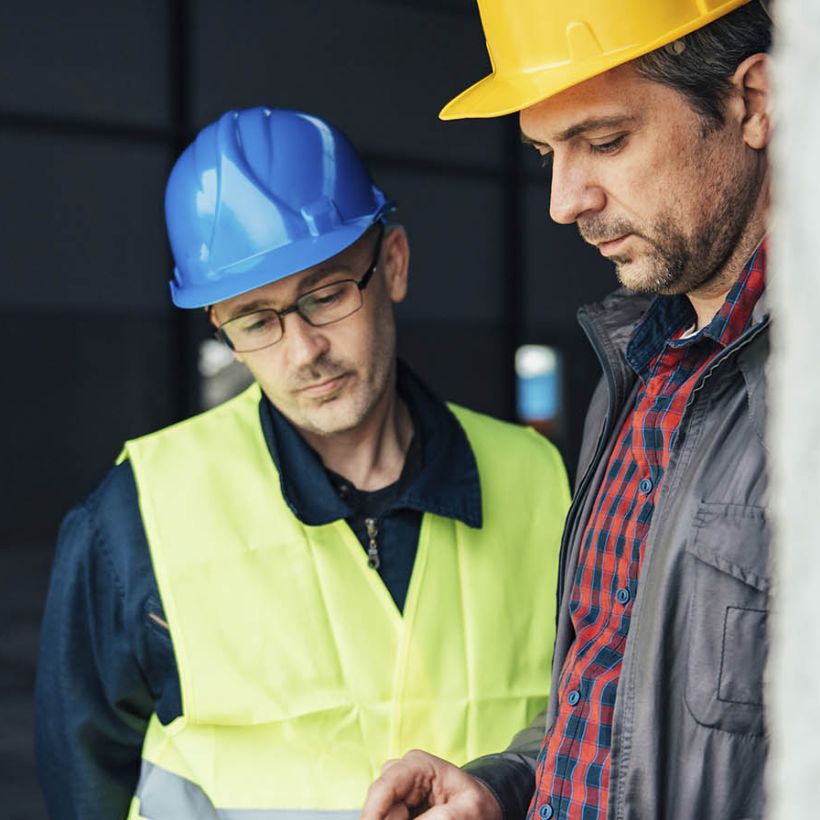 Worker on building construction site